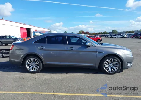 2014 Ford Taurus Limited z USA, uszkodzony, nr VIN 1FAHP2F84EG111159